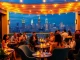 Enjoy breathtaking views of Manhattan at NoHu Rooftop, a stunning dining experience.