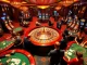 Players enjoying their favorite games at trang chủ 78win casino, showcasing action on poker and blackjack tables.