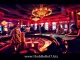 A bustling casino floor at https://thabet7.biz/ showcasing roulette excitement and lively gamblers.