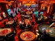 The exciting atmosphere of a casino featuring roulette tables and slot machines, showcasing online gaming interface for https://nohu90g.com users.